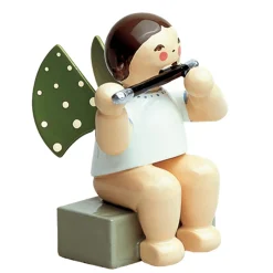 Engel mit Querflöte, sitzend