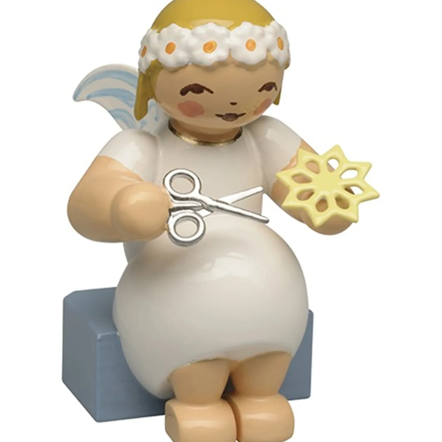 Margaritenengel mit Papierstern, sitzend