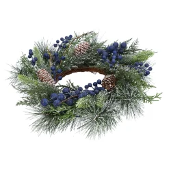 Tür- oder Tischkranz mit blauen Beeren und Zapfen