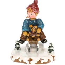 Winterkinder Schlittenfahrer